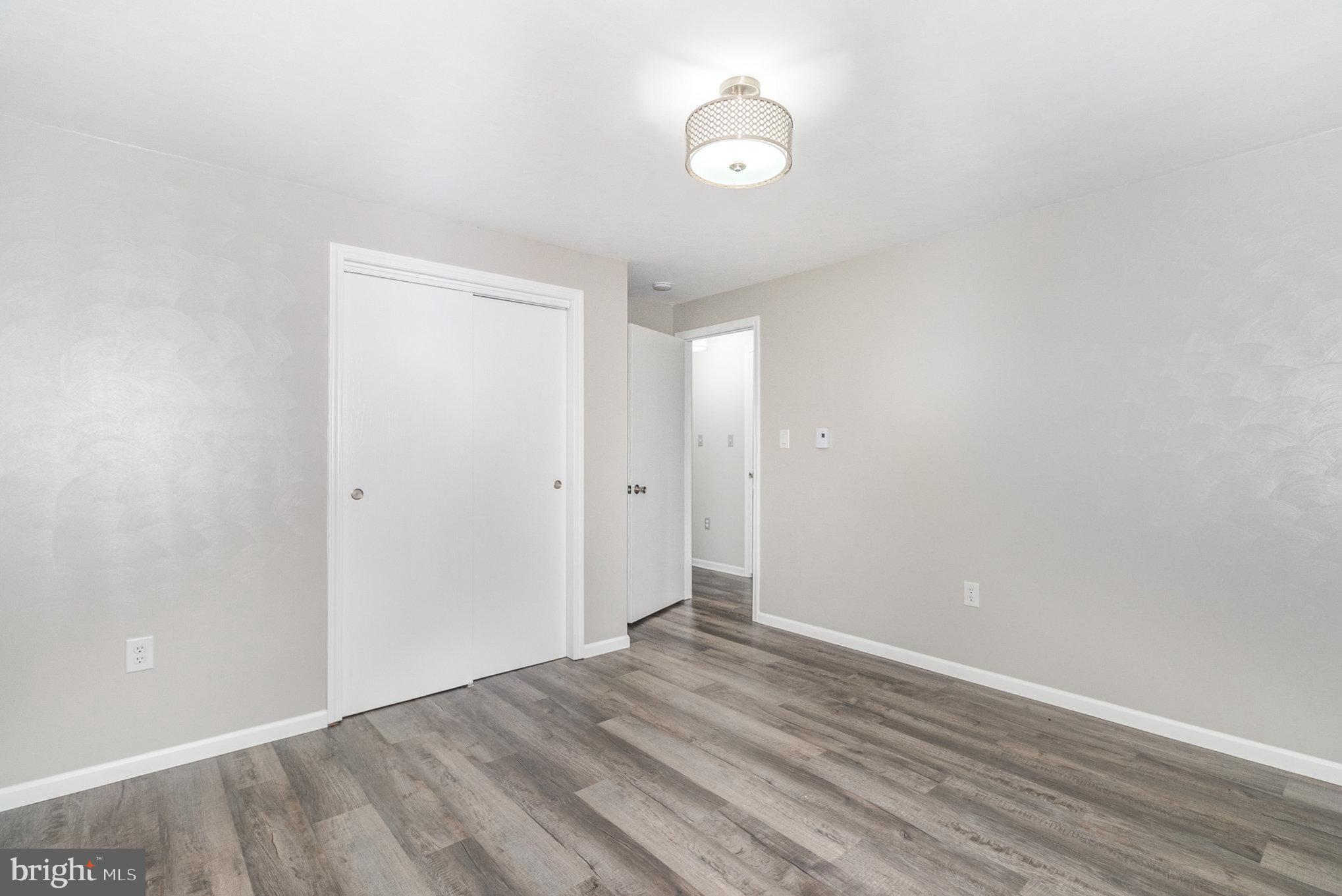 15 Penn Circle Hanover, PA 17331 - Photo 18 of 32 a view of an empty room with wooden floor