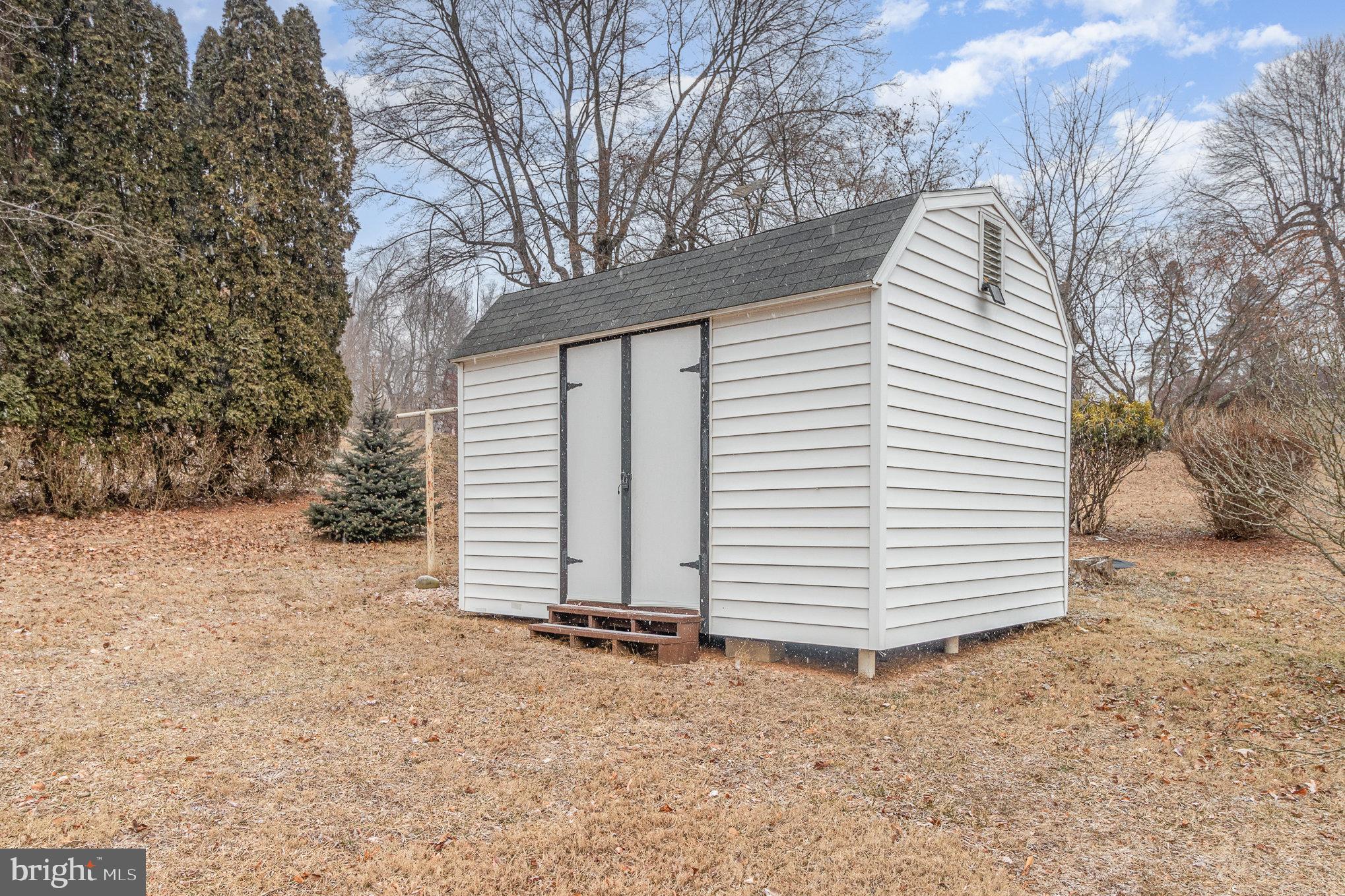 15 Penn Circle Hanover, PA 17331 - Photo 30 of 32 a view of a house with a yard and garage
