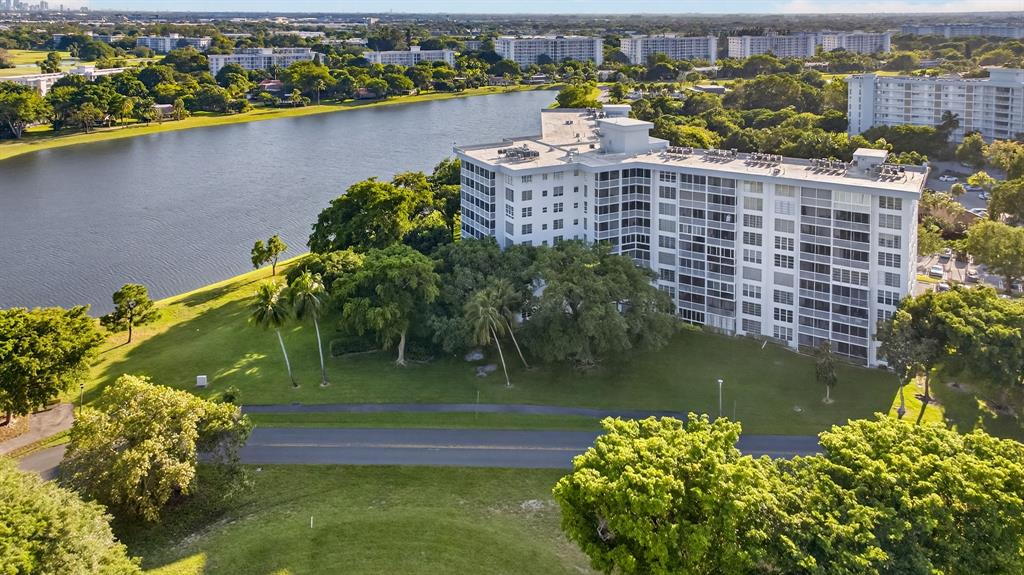a view of a lake with a building in the background