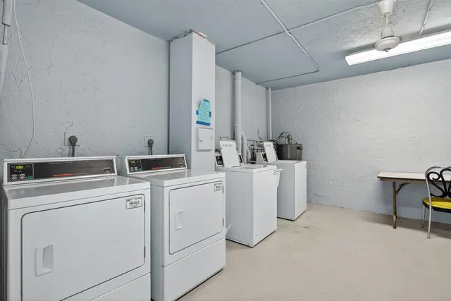 a room with dryer and washer