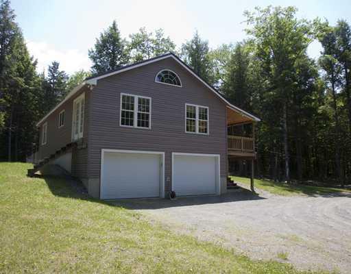 8 Beaver Brook Road Dover-Foxcroft, ME 04426 - Photo 23 of 25 Exterior Back. TV reception by DISH...