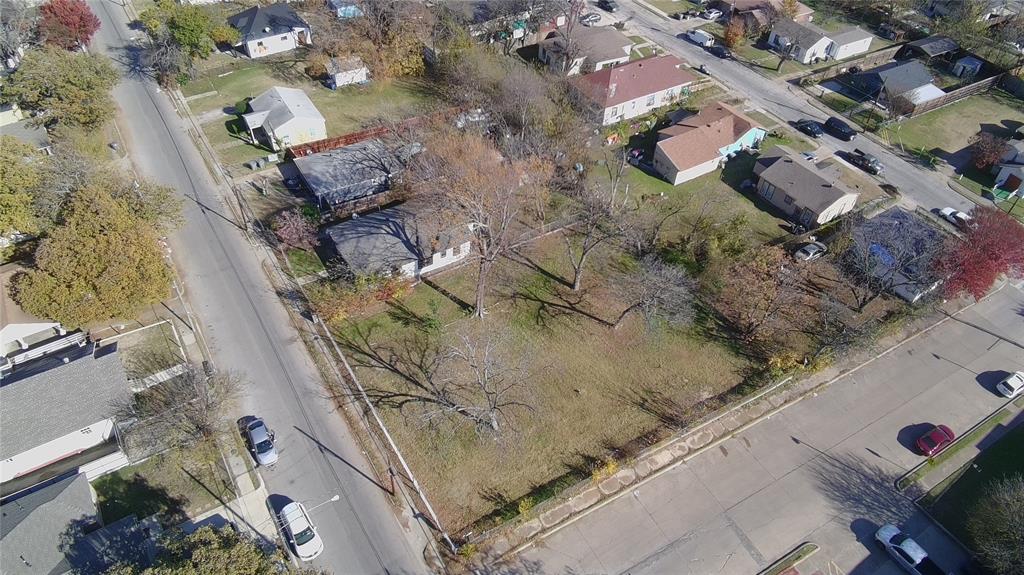 4302 Metropolitan Avenue Dallas, TX 75210 - Photo 11 of 12 an aerial view of a house with a yard