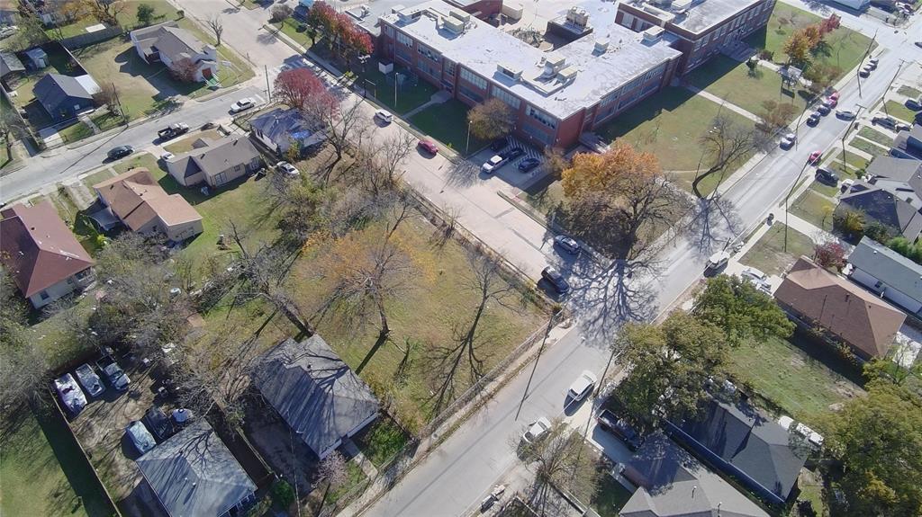 4302 Metropolitan Avenue Dallas, TX 75210 - Photo 8 of 12 an aerial view of a house with a yard