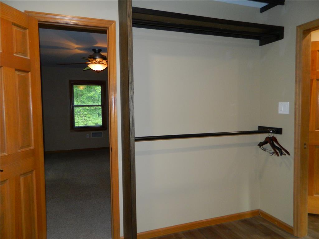 328 Pin Oak Road Stroudsburg, PA 18360 - Photo 32 of 42 Ample closet space with built-in hanging rods complements the adjoining bedroom's comfortable design.