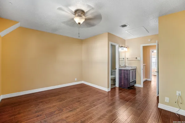 a view of a livingroom with wooden floor