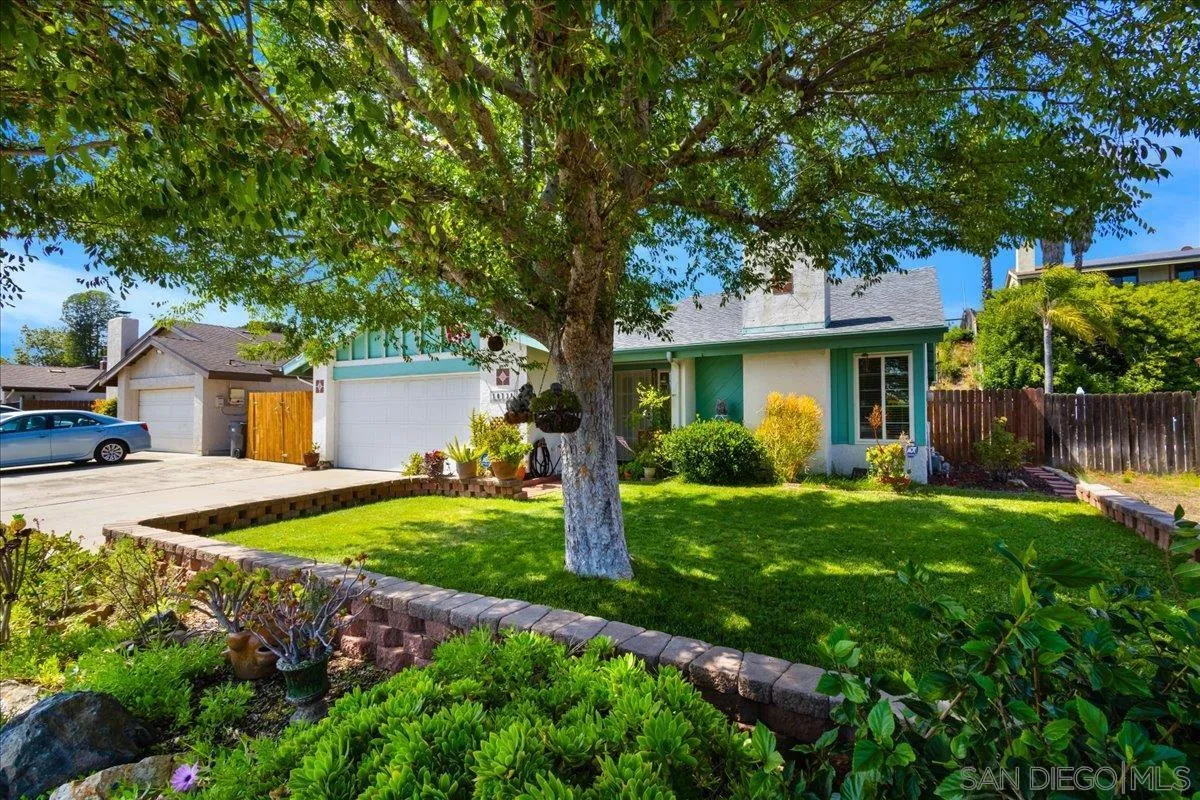 10738 2nd Street Santee, CA 92071 - Photo 44 of 52 a front view of a house with garden