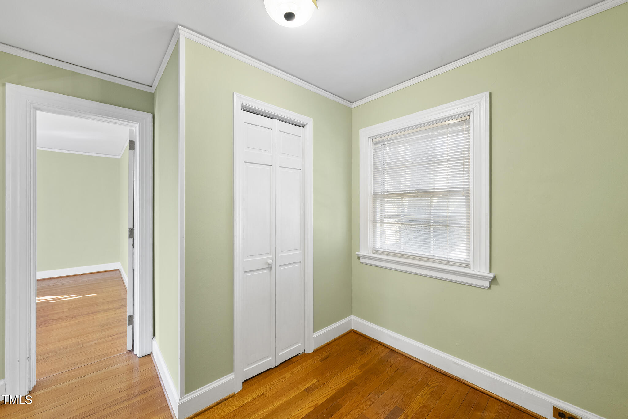 23 Shepherd Street Raleigh, NC 27607 - Photo 22 of 36 a view of empty room with wooden floor