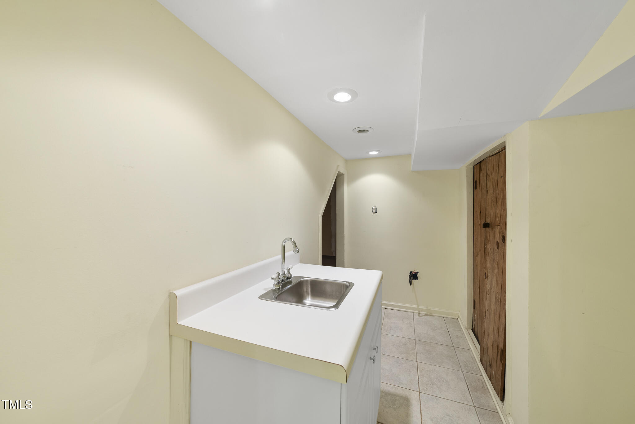 23 Shepherd Street Raleigh, NC 27607 - Photo 33 of 36 a bathroom with a sink and a mirror