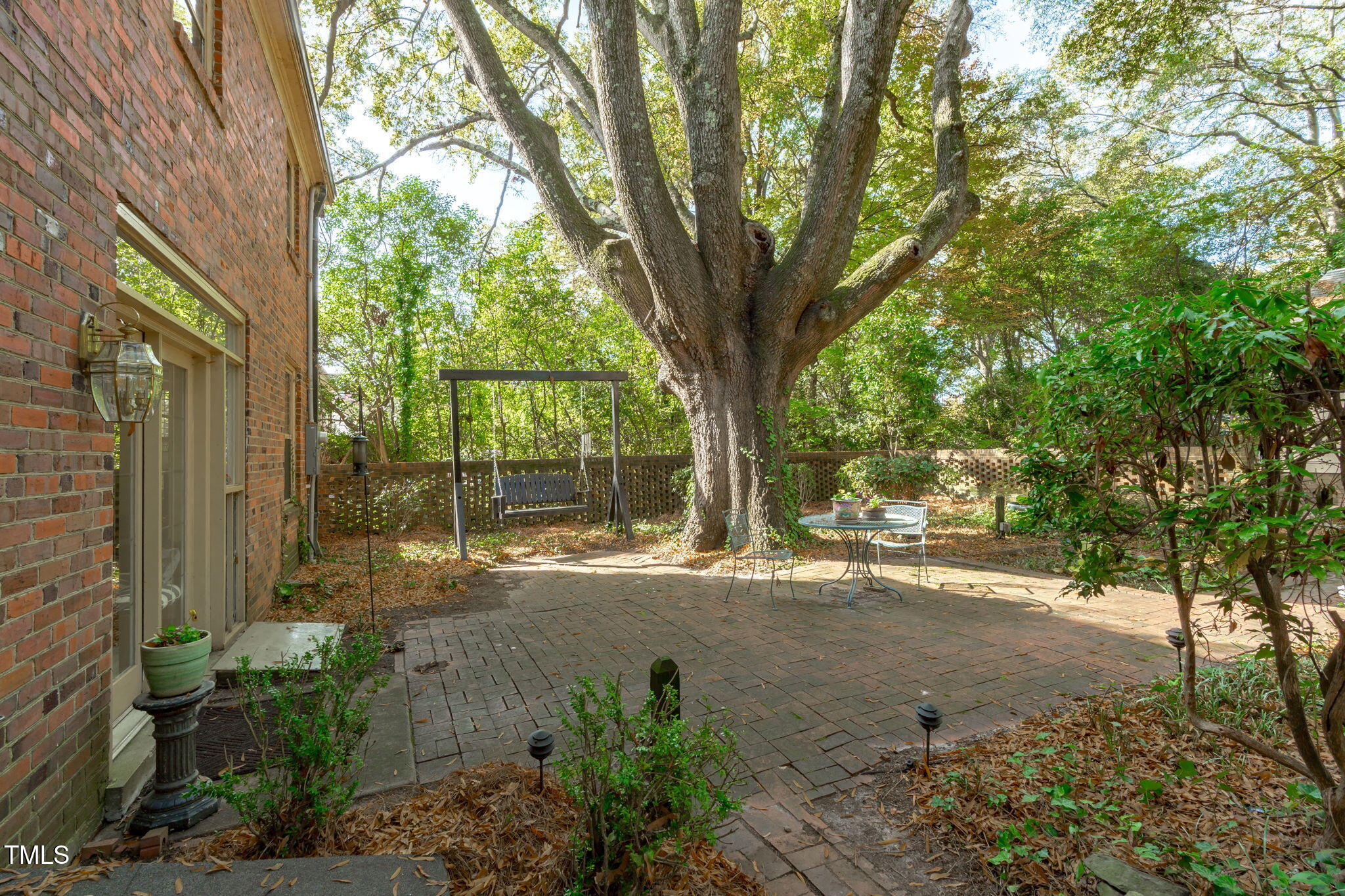 23 Shepherd Street Raleigh, NC 27607 - Photo 36 of 36 a view of a yard with plants and trees