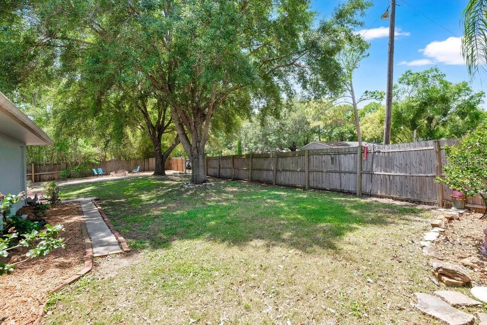 525 Rachael Court Oviedo, FL 32765 - Photo 35 of 37 a view of a backyard with tree s