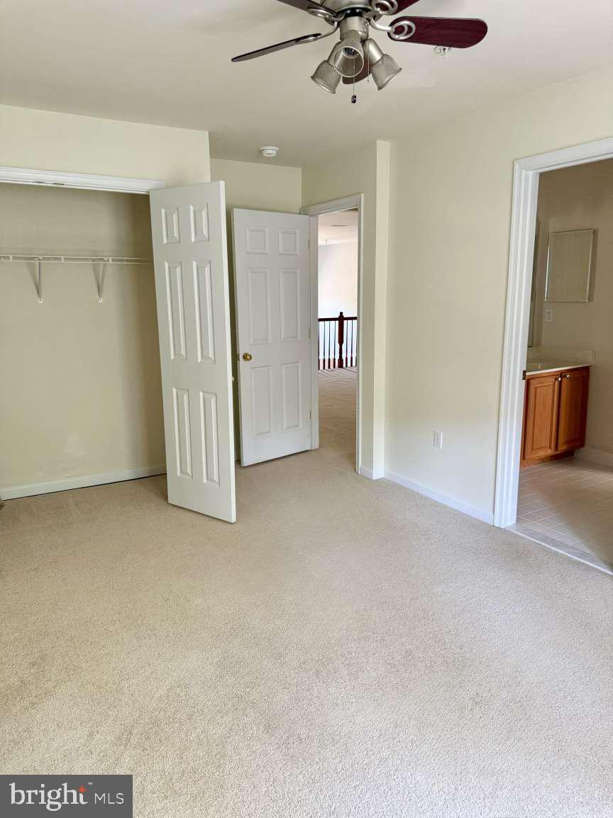 629 Ruxton Road, Unit 74 Solomons, MD 20629 - Photo 18 of 24 a view of a livingroom with a staircase