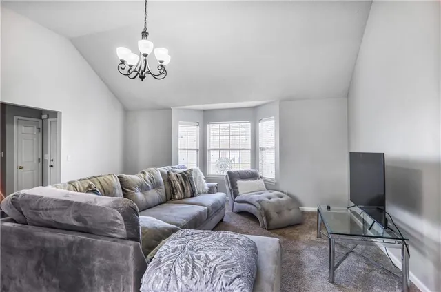 a living room with furniture or couch and a flat screen tv