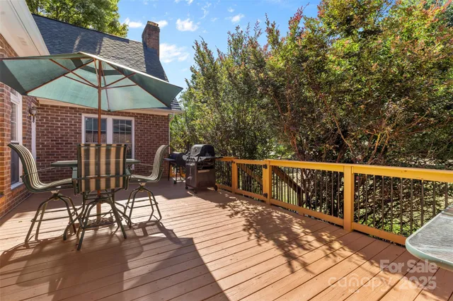 a view of a balcony with chairs