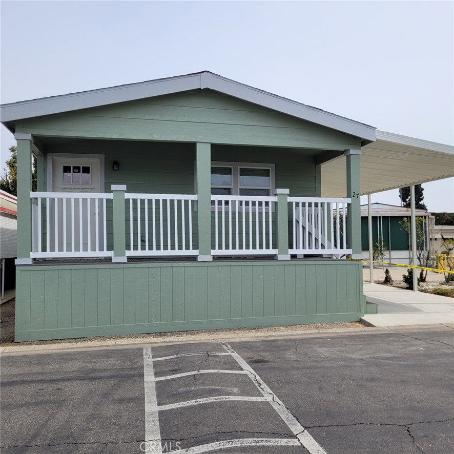 a view of a house with a deck