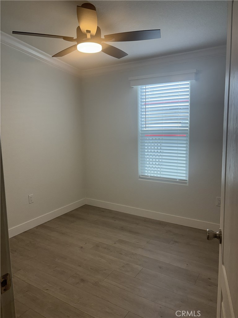 10550 Dunlap Crossing Road, Unit 27 Whittier, CA 90606 - Photo 13 of 14 an empty room with a empty space and a window