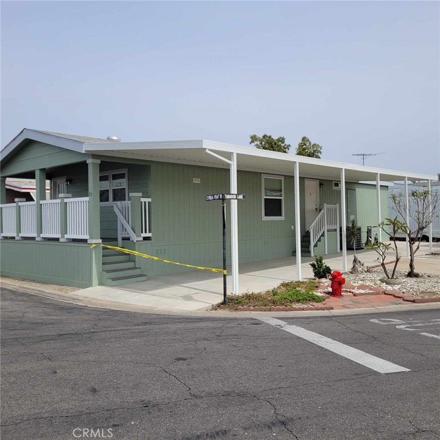 10550 Dunlap Crossing Road, Unit 27 Whittier, CA 90606 - Photo 3 of 13 a view of the house with basketball court