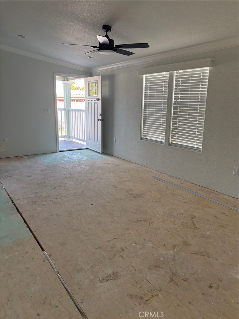 10550 Dunlap Crossing Road, Unit 27 Whittier, CA 90606 - Photo 4 of 13 a view of an empty room with a window
