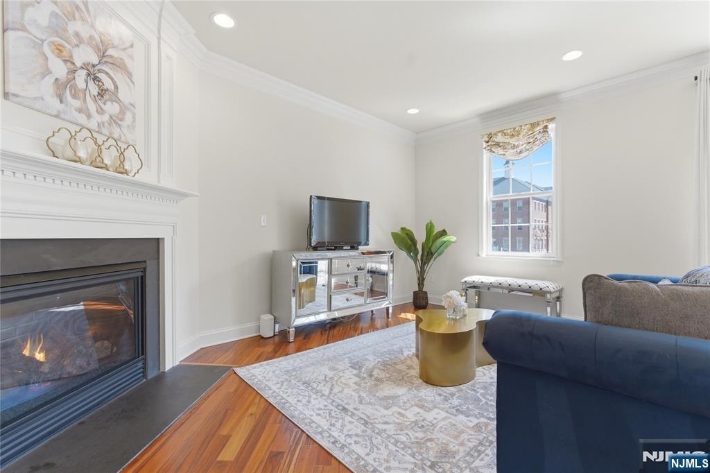 14 Gable Walk Livingston, NJ 07039 - Photo 19 of 41 a living room with furniture and a fireplace