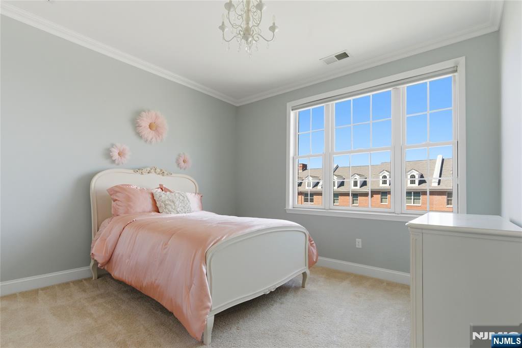 14 Gable Walk Livingston, NJ 07039 - Photo 28 of 41 a bedroom with a bed and large window