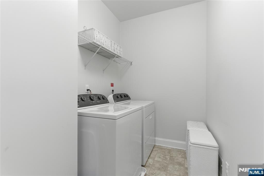 14 Gable Walk Livingston, NJ 07039 - Photo 32 of 41 a utility room with dryer and washer
