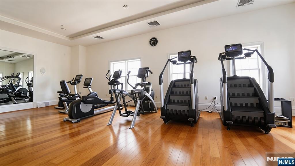14 Gable Walk Livingston, NJ 07039 - Photo 38 of 41 a view of a room with gym equipment