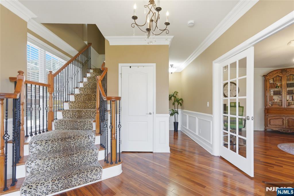 14 Gable Walk Livingston, NJ 07039 - Photo 4 of 41 a view of entryway and hall with wooden floor