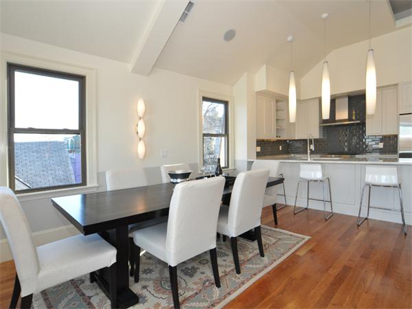 60 Sheridan Street, Unit 3 Boston, MA 02130 - Photo 1 of 1 a view of a dining room with furniture and wooden floor