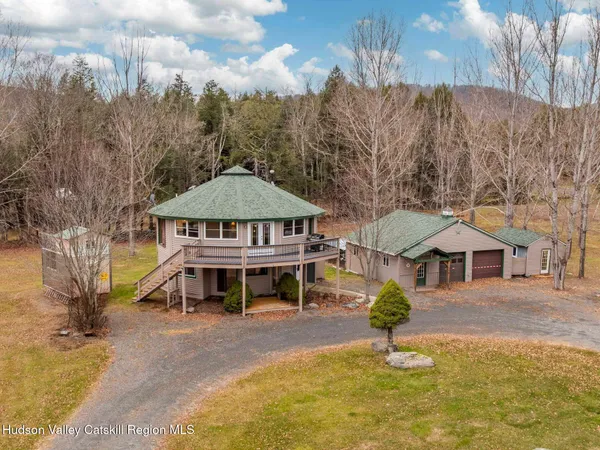 a view of balcony with wooden floor