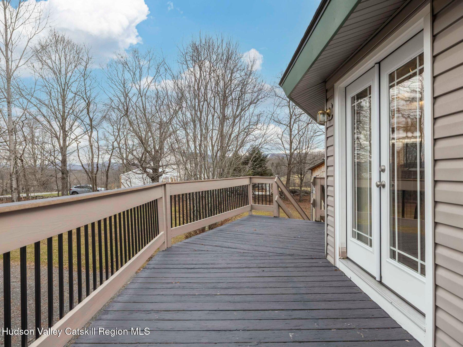 215 Siam Road Windham, NY 12496 - Photo 13 of 65 a view of balcony with seating space