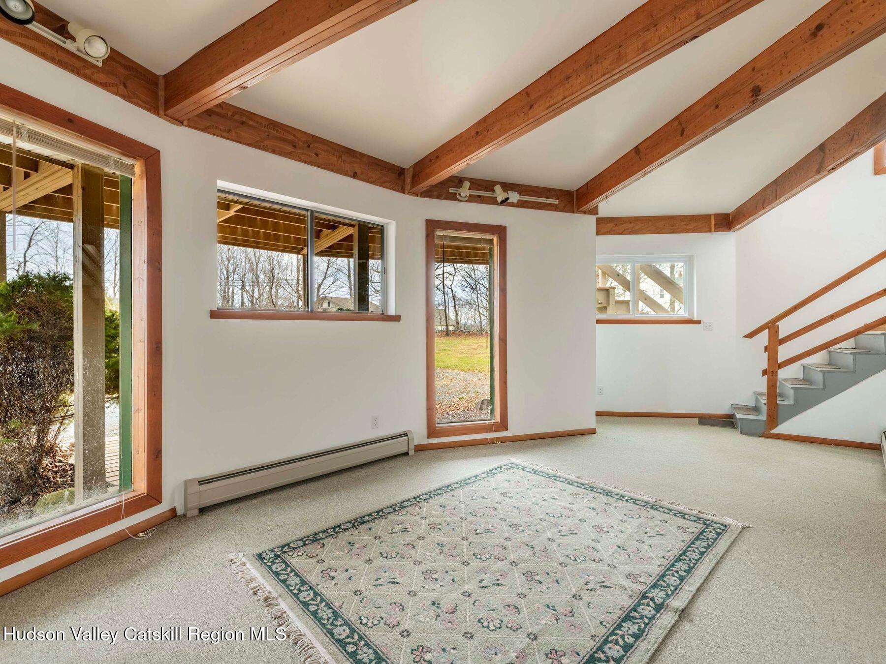 215 Siam Road Windham, NY 12496 - Photo 15 of 65 an empty room with windows