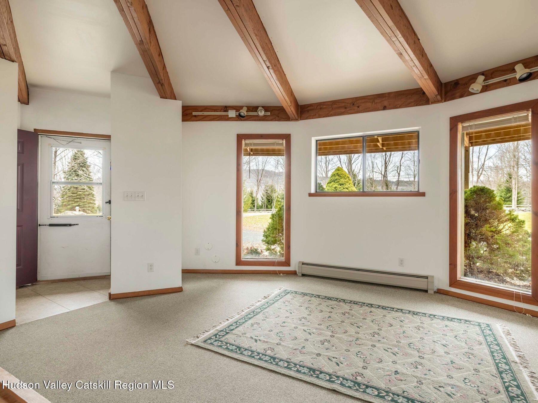 215 Siam Road Windham, NY 12496 - Photo 16 of 65 an empty room with windows