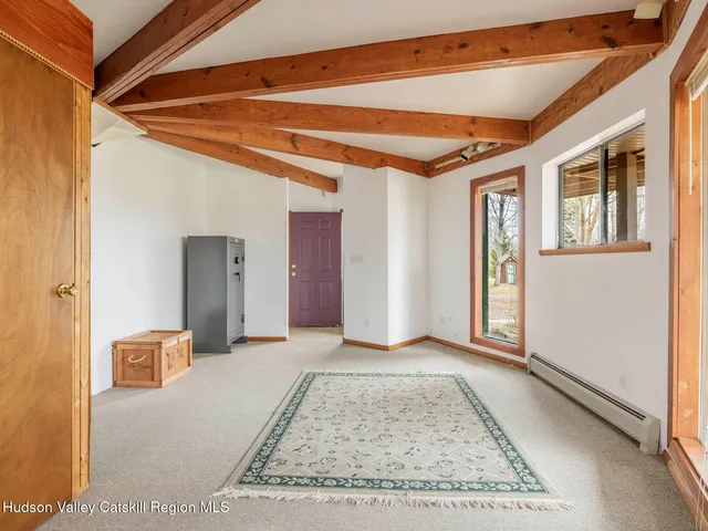 a kitchen with stainless steel appliances granite countertop a sink a stove a refrigerator and a cabinets