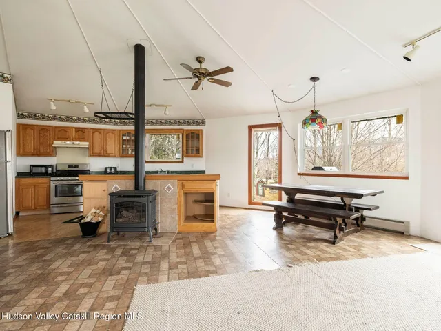 a view of a field with an trees