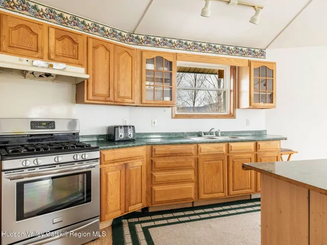 a view of swimming pool with a yard