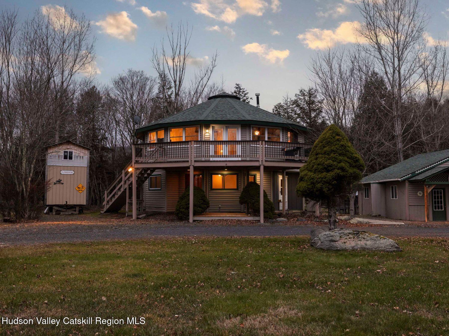 215 Siam Road Windham, NY 12496 - Photo 63 of 65 a front view of a house with a yard