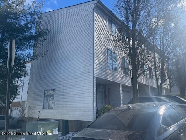 168 Jamie Lane Staten Island, NY 10312 - Photo 3 of 3 a view of a house with a yard