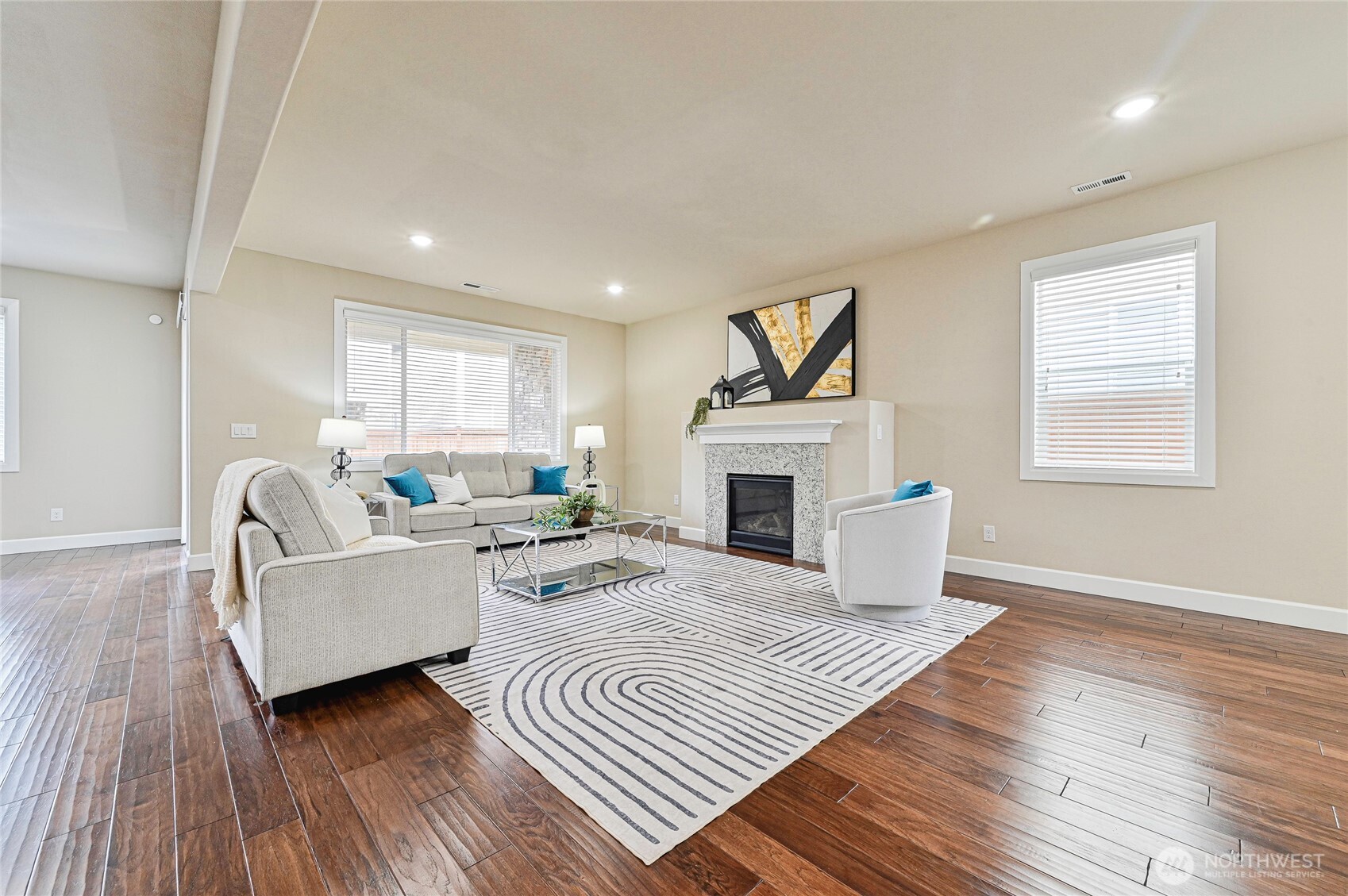17312 40th Avenue Southeast Bothell, WA 98012 - Photo 6 of 34 a living room with furniture and a fireplace