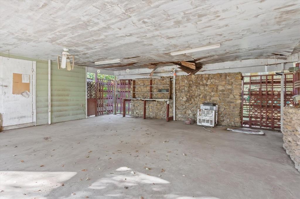 1118 Kane Street Waco, TX 76705 - Photo 24 of 32 a view of a garage with an empty space