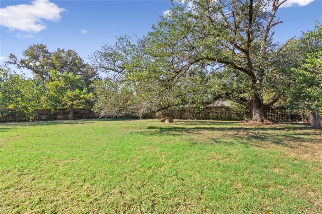 1118 Kane Street Waco, TX 76705 - Photo 29 of 32 a view of a field of grass and trees