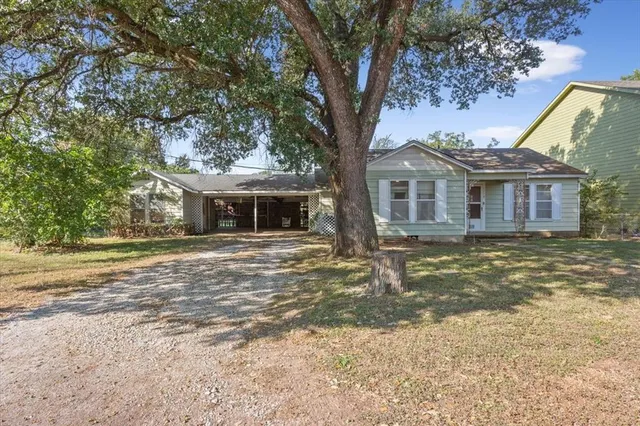 a view of a house with a swimming pool