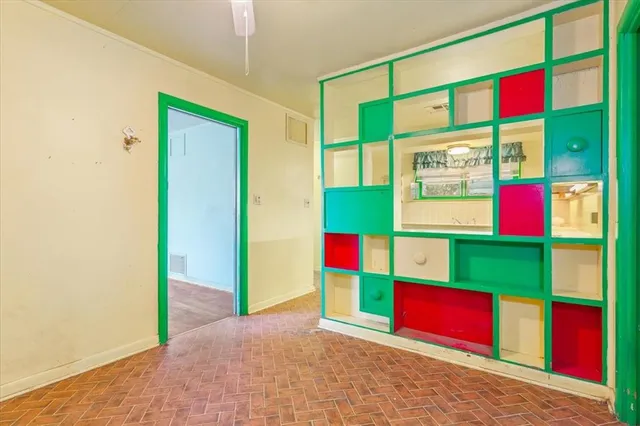 a view of front door with yard