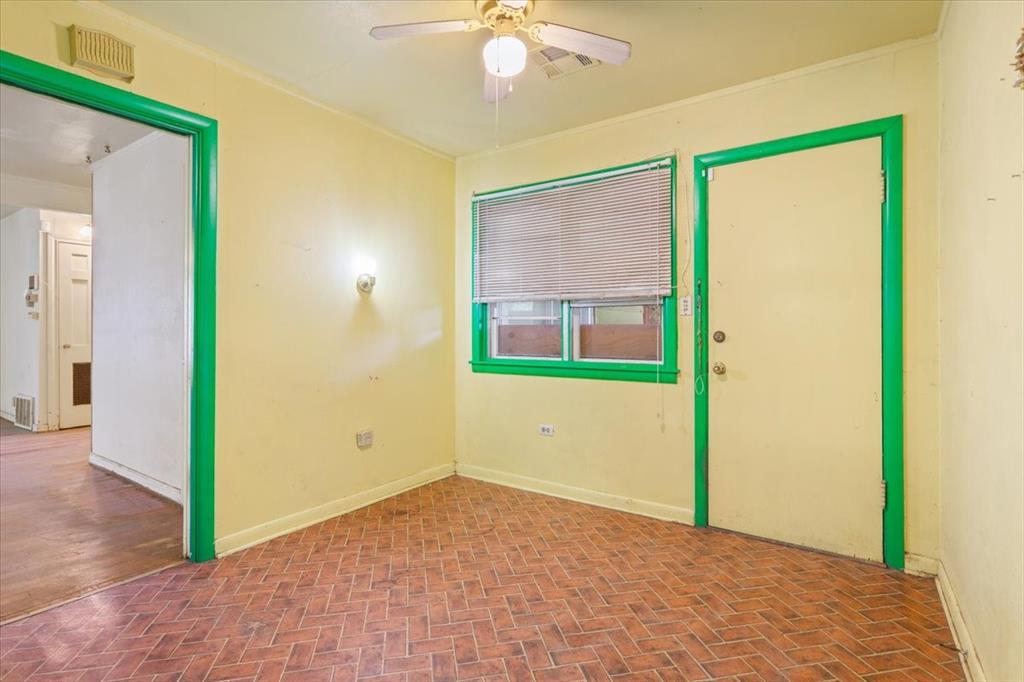 1118 Kane Street Waco, TX 76705 - Photo 9 of 32 a view of an empty room with a window