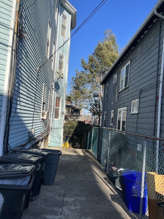 90 Forbes Street Boston, MA 02130 - Photo 22 of 22 a view of a house with a patio