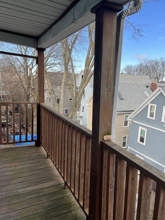 90 Forbes Street Boston, MA 02130 - Photo 3 of 22 a view of a balcony with wooden floor