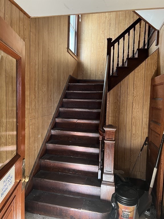 90 Forbes Street Boston, MA 02130 - Photo 8 of 22 a view of entryway with wooden floor and stairs