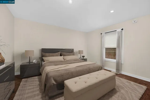 a room with a bed and a window