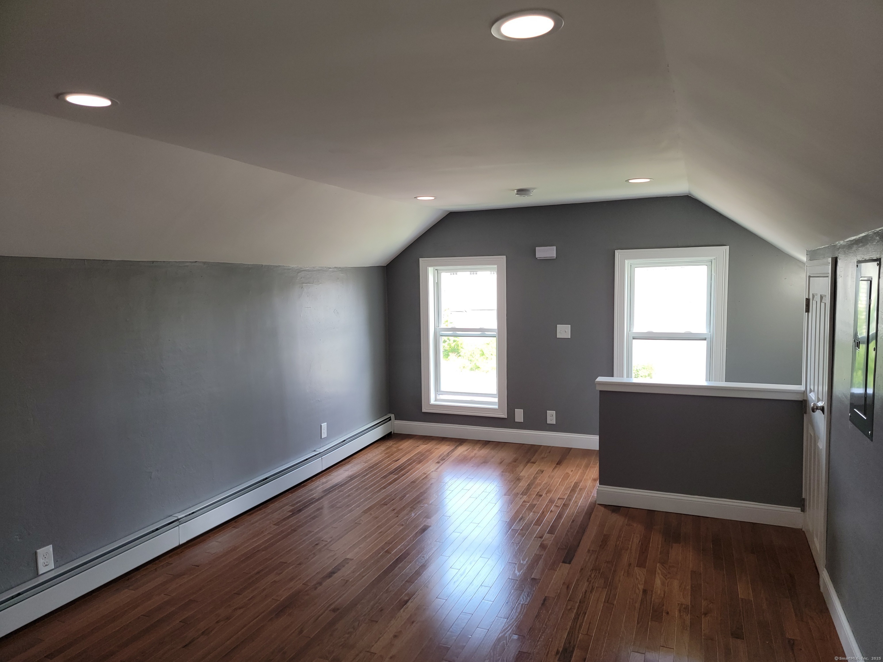 3 Water Street Killingly, CT 06239 - Photo 13 of 38 an empty room with wooden floor and windows