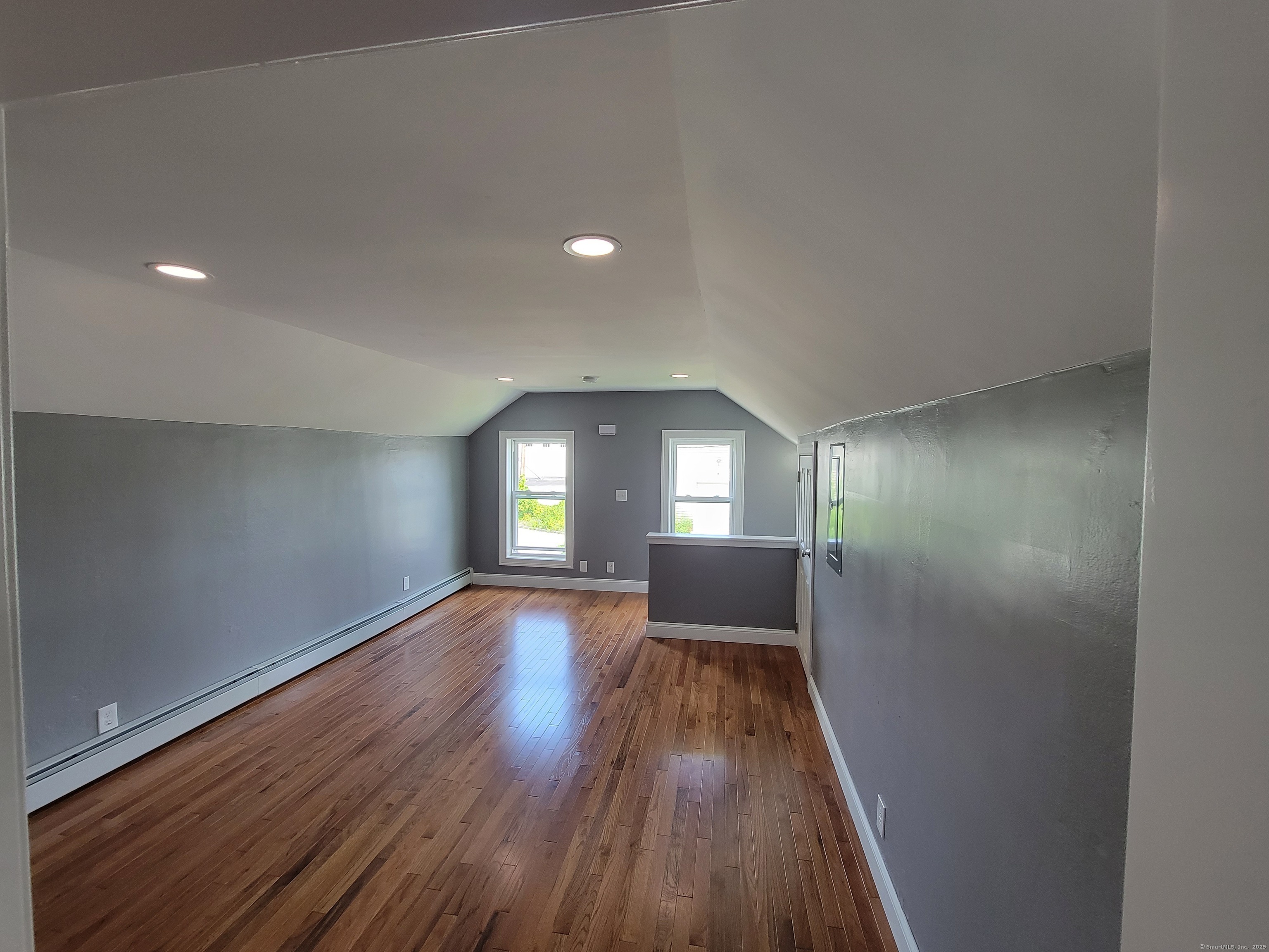 3 Water Street Killingly, CT 06239 - Photo 14 of 38 wooden floor in an empty room with a window