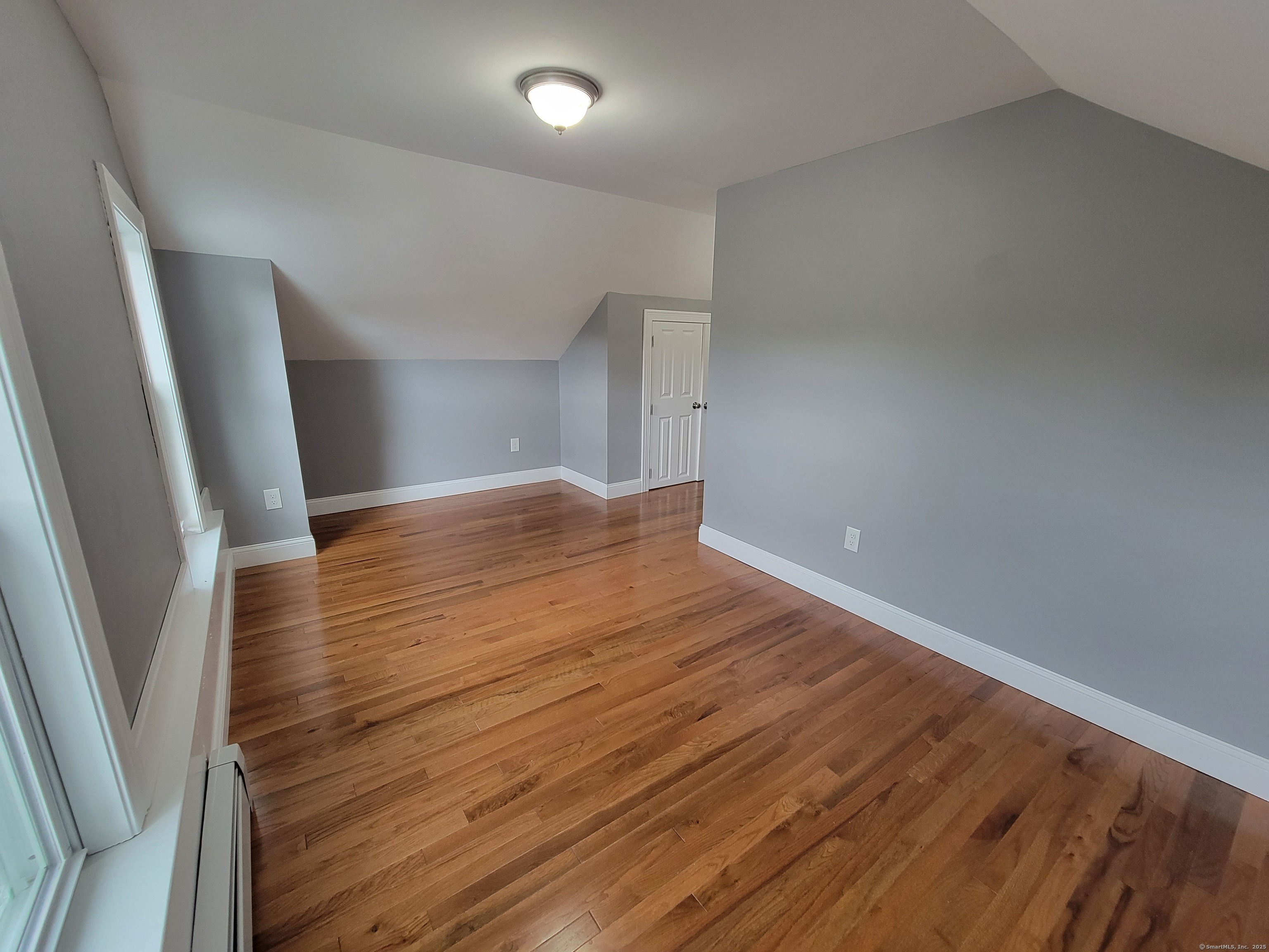 3 Water Street Killingly, CT 06239 - Photo 20 of 38 an empty room with wooden floor and entrance