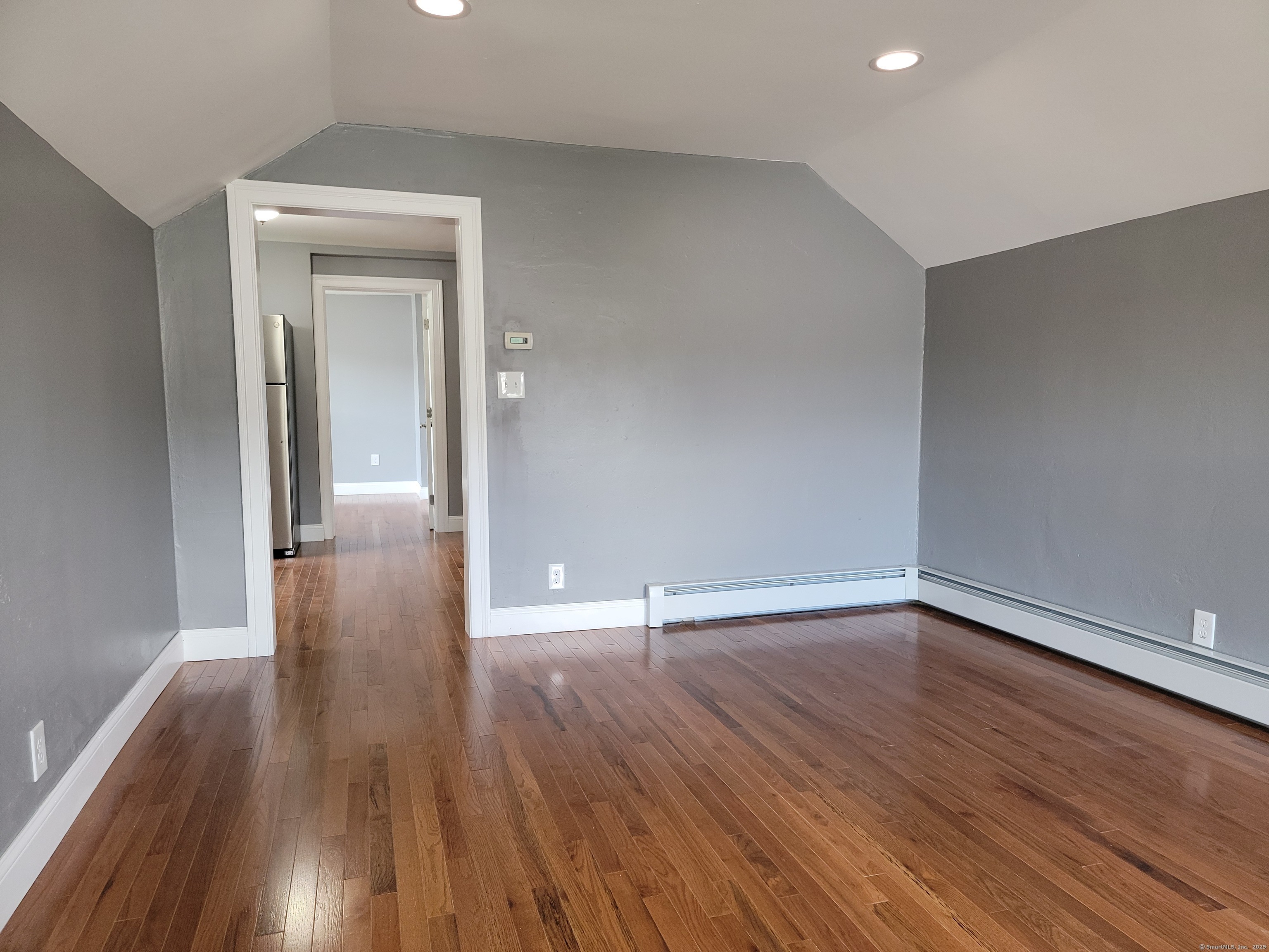 3 Water Street Killingly, CT 06239 - Photo 22 of 38 wooden floor in an empty room with a window